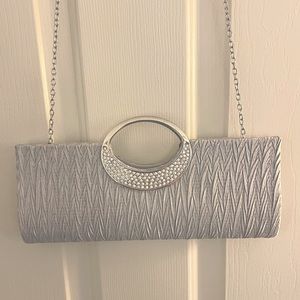 Silver evening bag on silver chain strap
